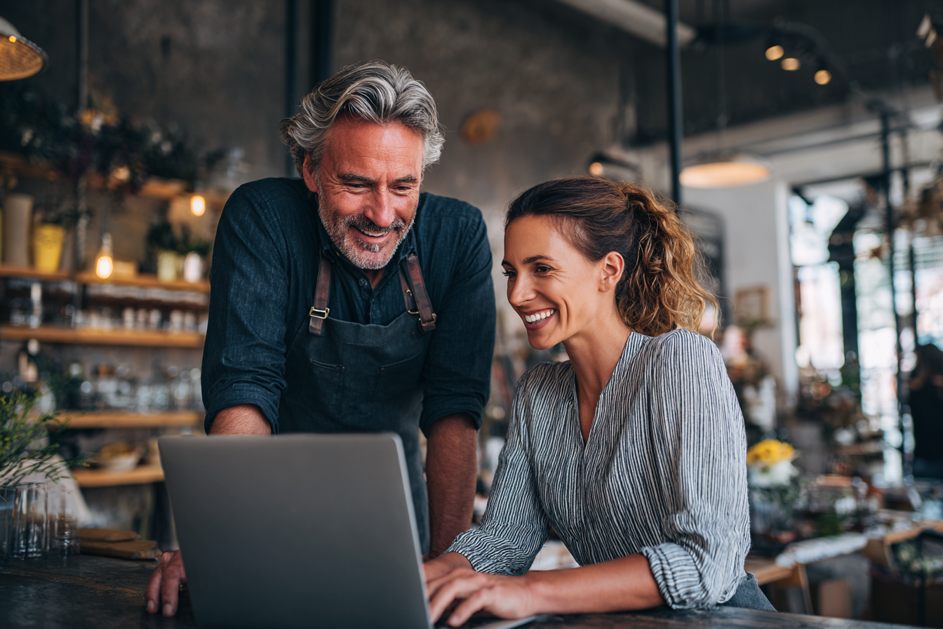 A mentor guiding an aspiring business owner through planning